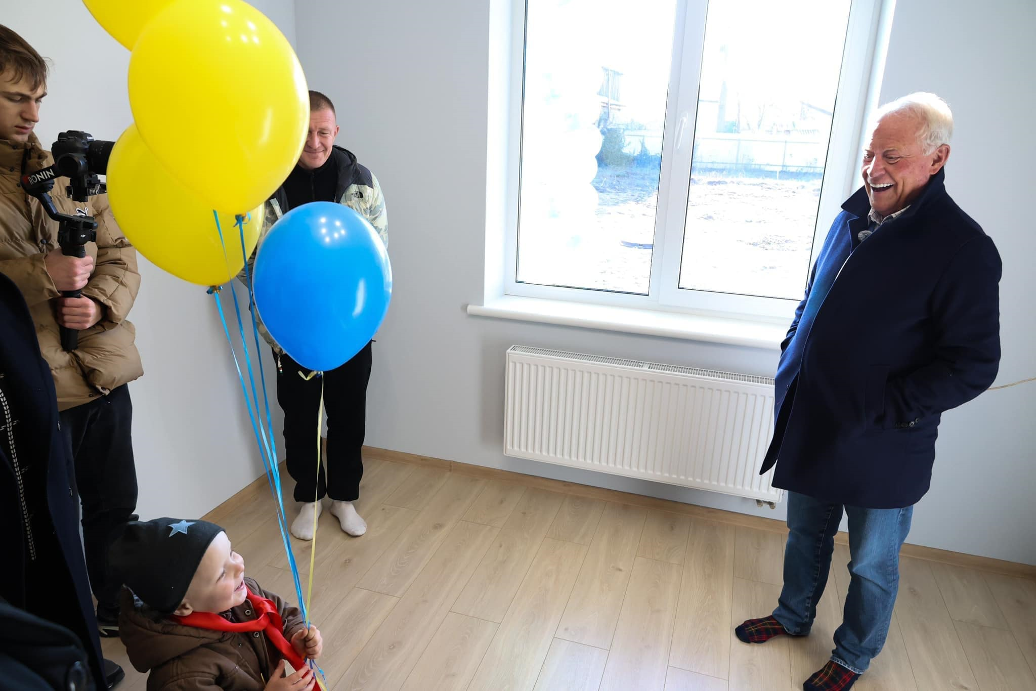 Колір надії Слободи від Хансена: у деокупованому селі почали з’являтися персикові будинки