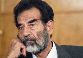 Саддам благає